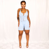 Ultra soft stretchy knit romper Plunge neck Rhinestone lace up detail Adjustable straps Available in sizes Small, Medium, and Large Model is wearing size small